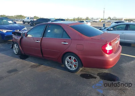 2002 Toyota Camry Le z USA, uszkodzony, nr VIN 4T1BE32K22U054336